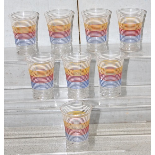 1616 - A set of 8 colourful retro French drinking tumblers