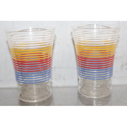 1616 - A set of 8 colourful retro French drinking tumblers