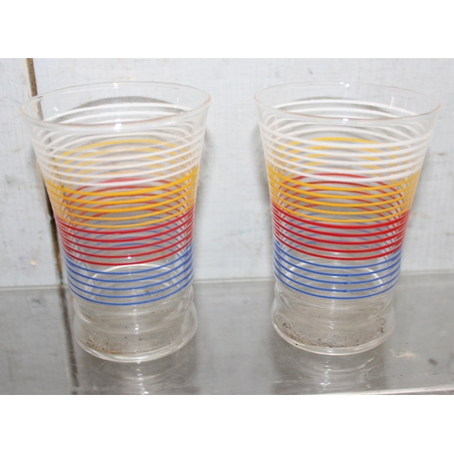 1616 - A set of 8 colourful retro French drinking tumblers