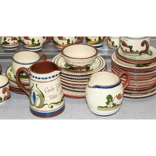 1740 - A huge qty of assorted Torquay mottoware pottery, dozens of pieces, 3 boxes