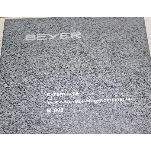 756 - A boxed pair of Beyer M808 microphones with stands