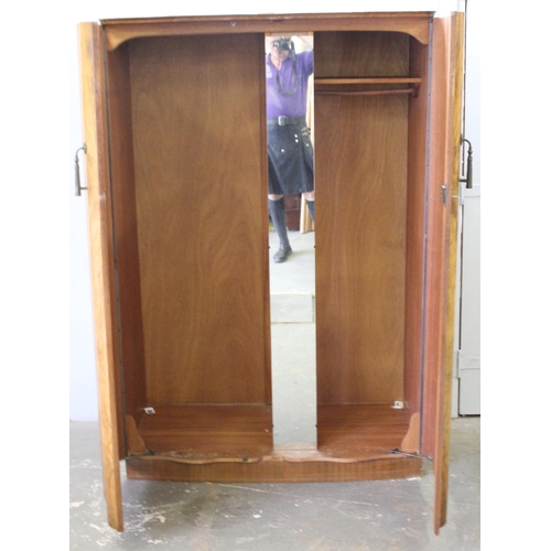 86 - A mid-century walnut veneered wardrobe with interior mirror, approx 125cm wide x 65cm deep x 184cm t... 