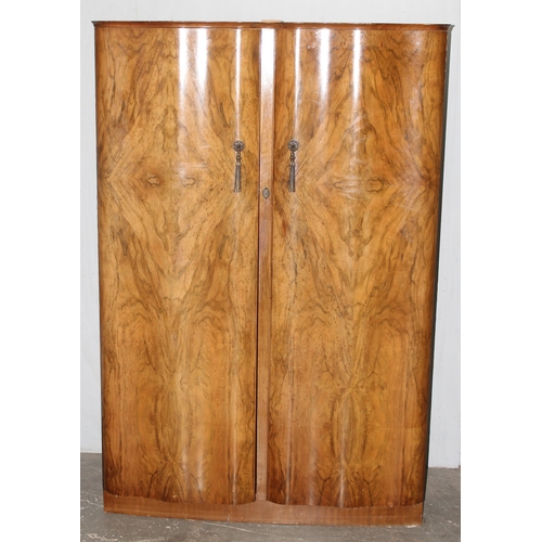 86 - A mid-century walnut veneered wardrobe with interior mirror, approx 125cm wide x 65cm deep x 184cm t... 