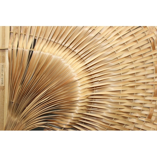 1801A - A large vintage wicker hand fan, approx 130cm tall