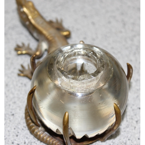 1657 - An unusual late 19th or early 20th century novelty brass and glass inkwell formed as a lizard and a ... 