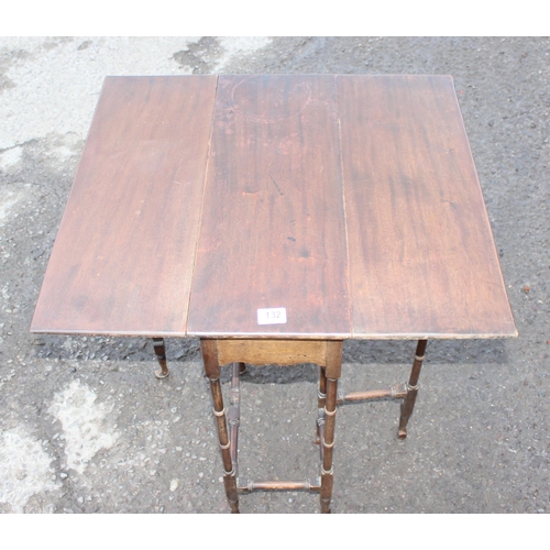 132 - In the manner of Liberty, an early 20th century mahogany Sutherland table with faux bamboo supports,... 