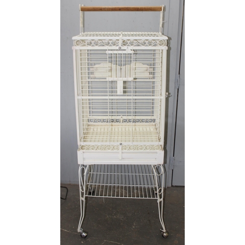 1784 - White parrot cage on wheels, approx 60cm x 60cm x 173cm