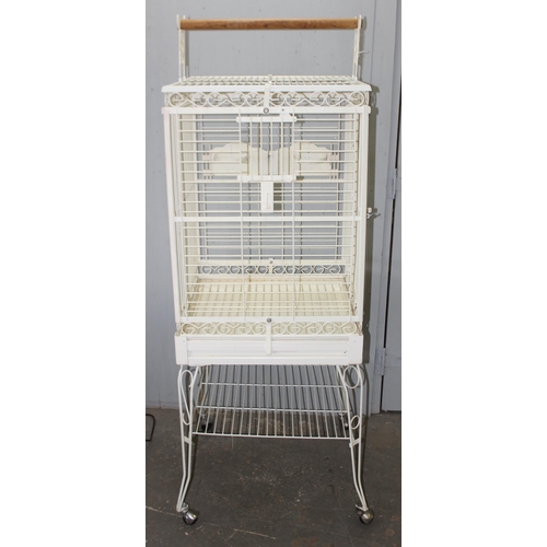 1784 - White parrot cage on wheels, approx 60cm x 60cm x 173cm