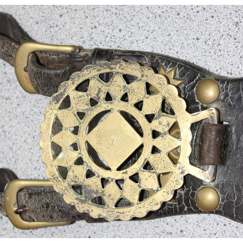 1798 - Qty of antique and later horse brasses and adornments, mostly on leather straps