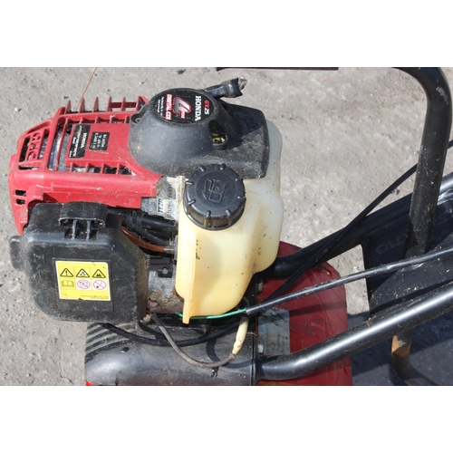 320 - Honda GX25 4-stroke garden tiller