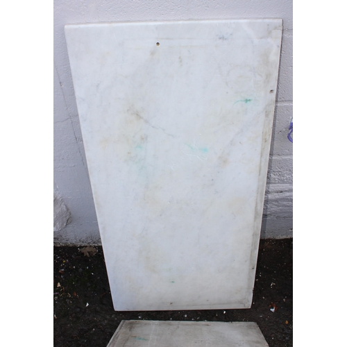 327 - 2 large slabs of white marble, approx 51cm x 107cm