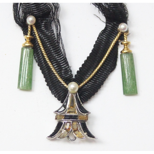 1128A - 3 necklaces to incl an unusual Art Deco period necklace on black fabric strap, the main pendant form... 