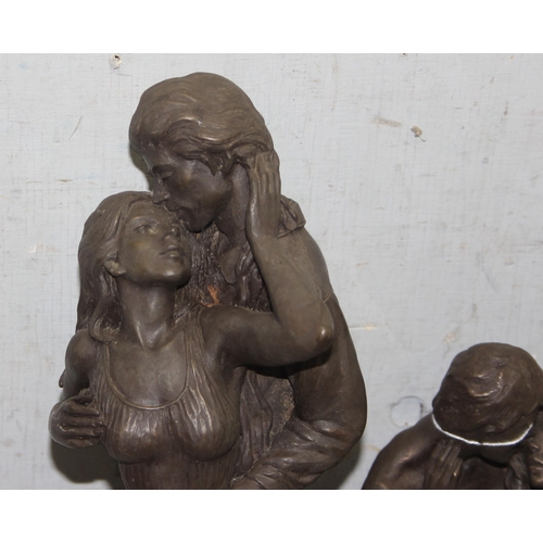 1752 - 2 bronze effect resin models of embracing couples, tallest approx 36cm tall