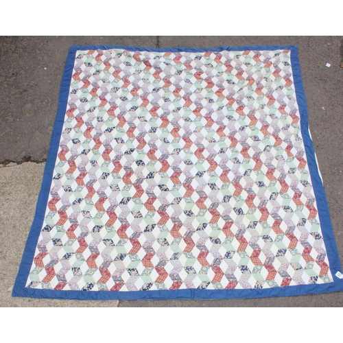 202 - A large vintage patchwork quilt, approx 240cm x 223cm