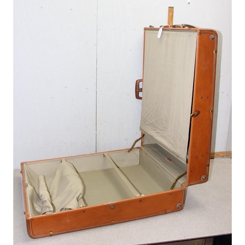 277 - Large vintage tan coloured Samsonite suitcase, approx 74cm x 55cm x 26cm