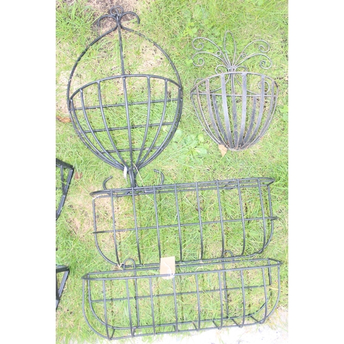 315 - 6 black wirework wall mounted baskets