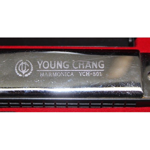 605 - Young Chang harmonica in case