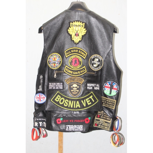 705 - Leather biker's waistcoat jacket by Zahra with adorned with Harley Davidson badges and patches among... 