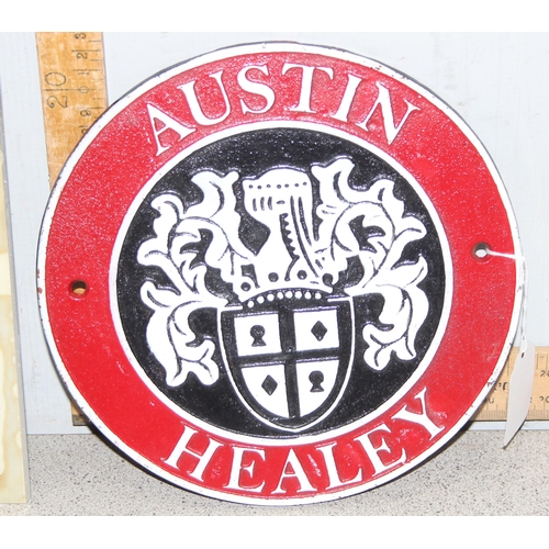 707 - 2 motor oil signs for 'Red Indian' and 'Castrol' (approx 42cm x 30cm) and a reproduction Austin Heal... 