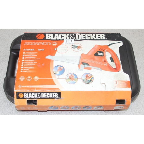 837 - Black & Decker electric saw in case, seemingly unused