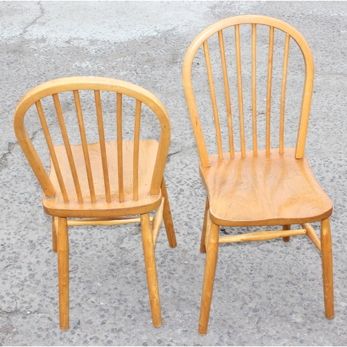 97 - 2 vintage Ercol style elm seated hoop back dining chairs, approx 85cm H