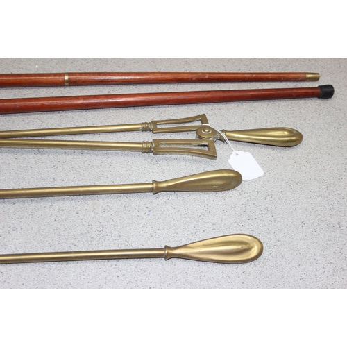 1767 - Art Deco brass three piece fire set - coal tongs, shovel, and poker approx 66cm long and a small bra... 