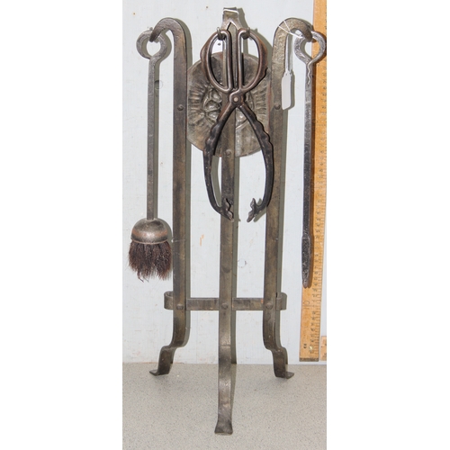 1768 - Hand forged iron three piece fire tool set on Tudor rose iron stand