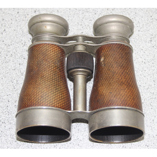 660 - Two Victorian brass monoculars and a pair of Victorian leather bound nickel plated binoculars (3)