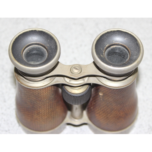 660 - Two Victorian brass monoculars and a pair of Victorian leather bound nickel plated binoculars (3)