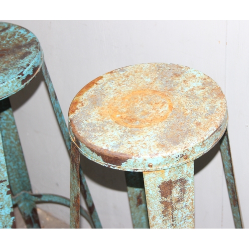 114 - Pair of blue metal stools, approx 77cm tall