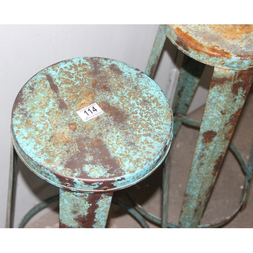 114 - Pair of blue metal stools, approx 77cm tall