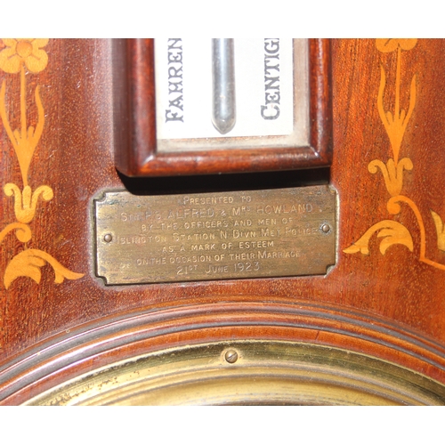 1313 - An early 20th century aneroid wall barometer by Kendal & Dent of London with inlaid detail, approx 8... 