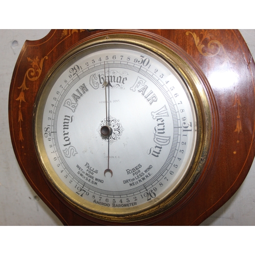 1313 - An early 20th century aneroid wall barometer by Kendal & Dent of London with inlaid detail, approx 8... 