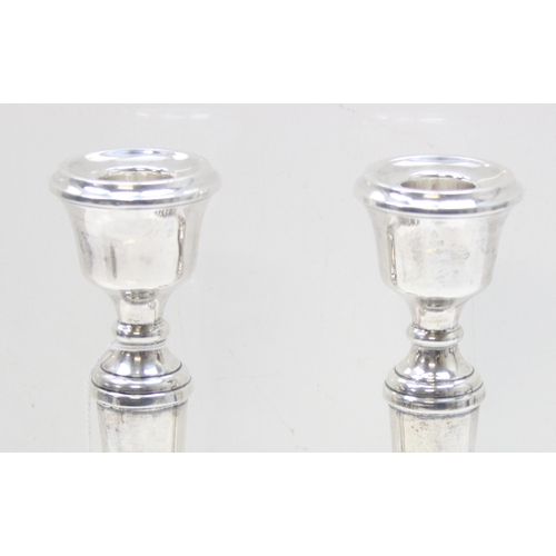 1002 - A pair of tall silver candlesticks, Birmingham 1971 by AT Cannon Limited, approx 21cm tall, approx 5... 