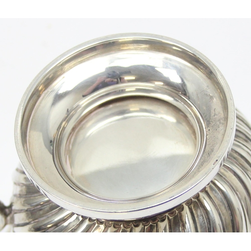 1003 - A George V period silver sugar bowl with fluted design, Sheffield 1924 by Atkin Brothers, approx 243... 