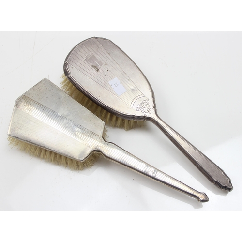 1009 - 2 silver backed brushes, one Birmingham 1963, the other unmarked but XRF tests as silver