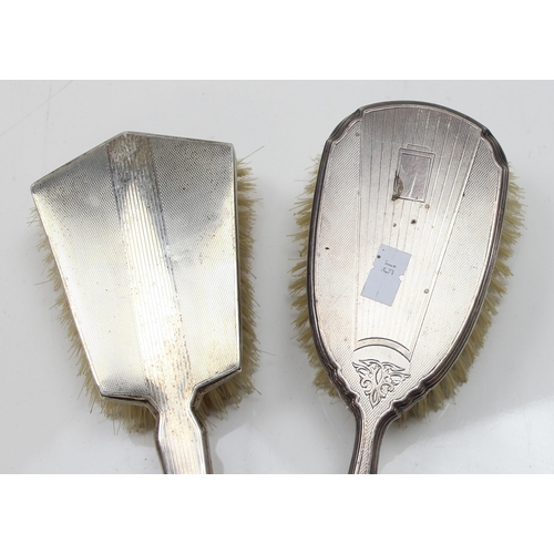 1009 - 2 silver backed brushes, one Birmingham 1963, the other unmarked but XRF tests as silver