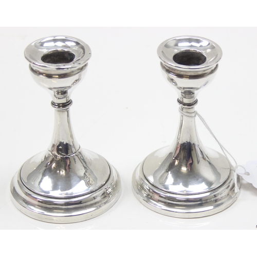 1041 - A pair of silver candlesticks, Birmingham 1915 by E.S. Barnard, each approx 10cm tall, approx 369.57... 