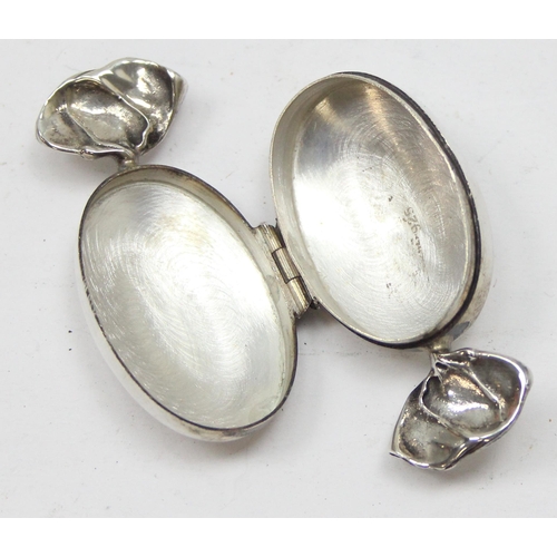 1043 - A small silver pill box formed as a sweet, import marks for Birmingham 1997, approx 11.54g gross