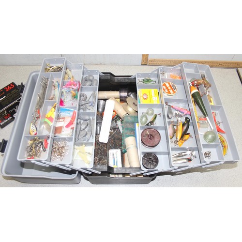 709 - Large qty of fishing equipment in box, to incl sea fishing reels, lead weights, fishing flies, hooks... 