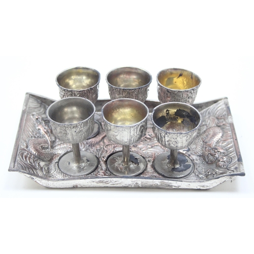 1047 - A small vintage Chinese silver plated serving tray and 6 goblets, the tray decorated with a Dragon, ... 