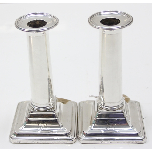 1052 - Pair of antique silver candlesticks, Sheffield 1910 by the Atkin Brothers, approx 13cm tall, approx ... 