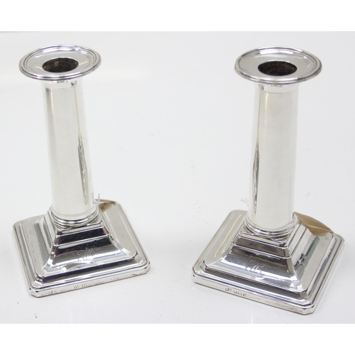 1052 - Pair of antique silver candlesticks, Sheffield 1910 by the Atkin Brothers, approx 13cm tall, approx ... 