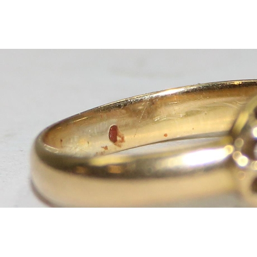 1101 - An 18ct gold and diamond ring in floral setting, seemingly unmarked but XRF tests as 18ct gold, appr... 