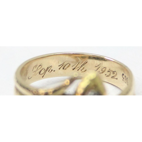 1102 - An unusual 14ct gold ring formed as 2 entwined snakes, one with diamond set head and the other with ... 