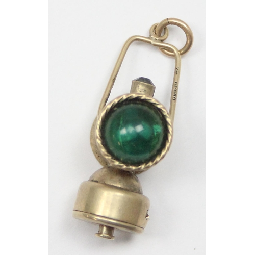 1106 - An unusual 9ct gold charm formed as a railway lamp, London 1964, approx 7.72g gross