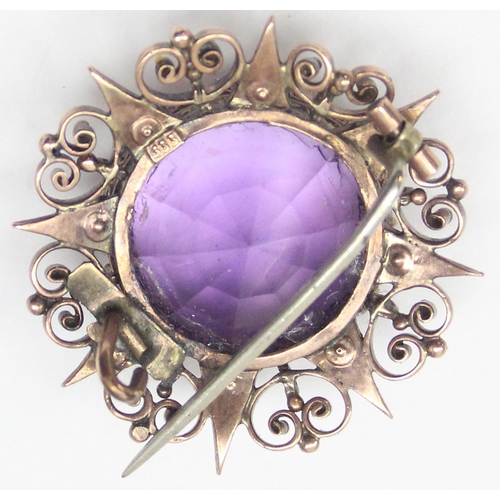 1110 - A German 8ct gold (.333) brooch set with large purple stone and a similar 8ct gold and filigree pend... 