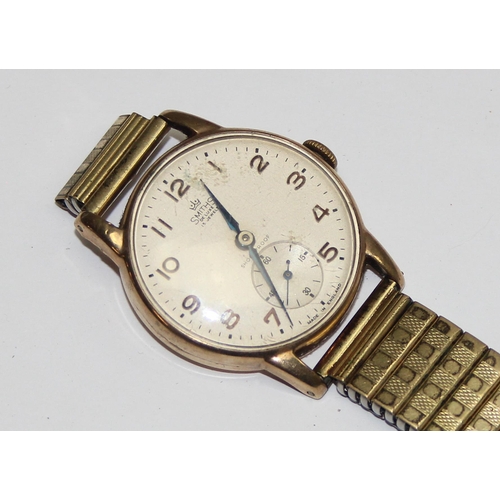 1304 - A 9ct gold cased vintage gents watch by Smiths, case marked for Birmingham 1959, on expanding gold p... 