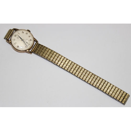 1304 - A 9ct gold cased vintage gents watch by Smiths, case marked for Birmingham 1959, on expanding gold p... 