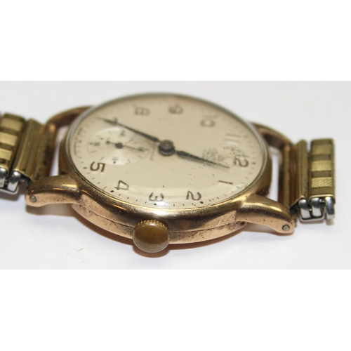 1304 - A 9ct gold cased vintage gents watch by Smiths, case marked for Birmingham 1959, on expanding gold p... 